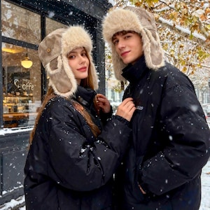 Trapper hat with a unique leather texture in classic models, unique winter souvenirs