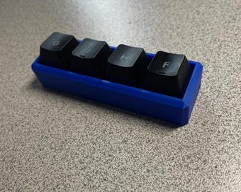 Fidget met viervoudige sleutelschakelaar