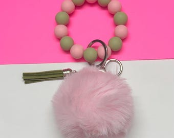 Pink and green wristlet with pom pom: Stretchy keychain