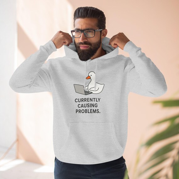 Currently Causing Problems’ Goose Hoodie – Viral Meme Graphic Pullover | Cozy Unisex Hoodie Gift for Fun Personalities