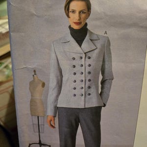 May include: A rustic wooden sign with the text "Welcome to our home" in white lettering. The sign features a distressed finish and a simple, inviting design, perfect for entryway decor.