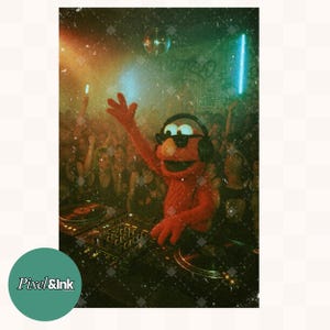 May include: A red puppet character wearing black sunglasses and black headphones, positioned behind a DJ mixing console with turntables. The scene is set in a crowded, dimly lit nightclub environment with vibrant green and orange lighting effects.