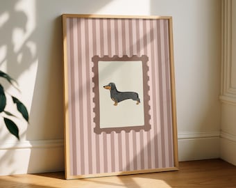May include: Framed art print featuring a dachshund illustration. The artwork is set against a background of vertical pink and white stripes. The dachshund is depicted in black and tan, within a postage stamp-style frame, and the wooden frame adds a natural touch.