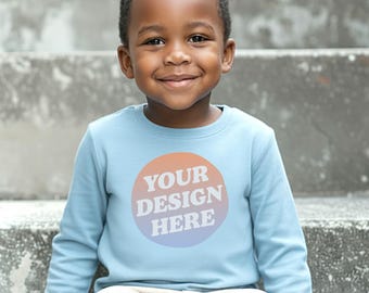 Mockup Rabbit Skins 3302 Toddler Youth Long Sleeve T-shirt in Light Blue with Boy model front view
