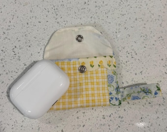 Earbud case/keychain