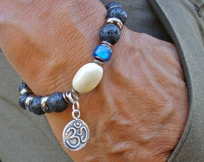 Yoga Om Organic Bracelet with Camajuro Matte Seed, Cobalt Sea Glass, Black Lava, Gunmetal Rondelles, Wood, and Silver Om Symbol Charm