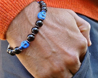 Men's Rocker Bracelet with Cobalt Howlite Carved Skulls, Black Agate, Gunmetal Rondelles and Bali Bead - Ghost - Steampunk Men's Bracelet