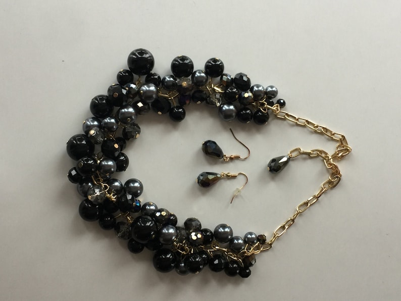 One of a kind chunky pearl necklace in crystals and black and dark gray pearls on gold chain