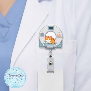 May include: A badge reel featuring a cartoon cat inside a CAT SCAN machine. The cat is orange and white, and the machine is white and light blue. The badge reel is attached to a white lab coat.