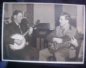 Photo of Vintage instruments playing vintage 30s 40s Banjo Unusual Guitar