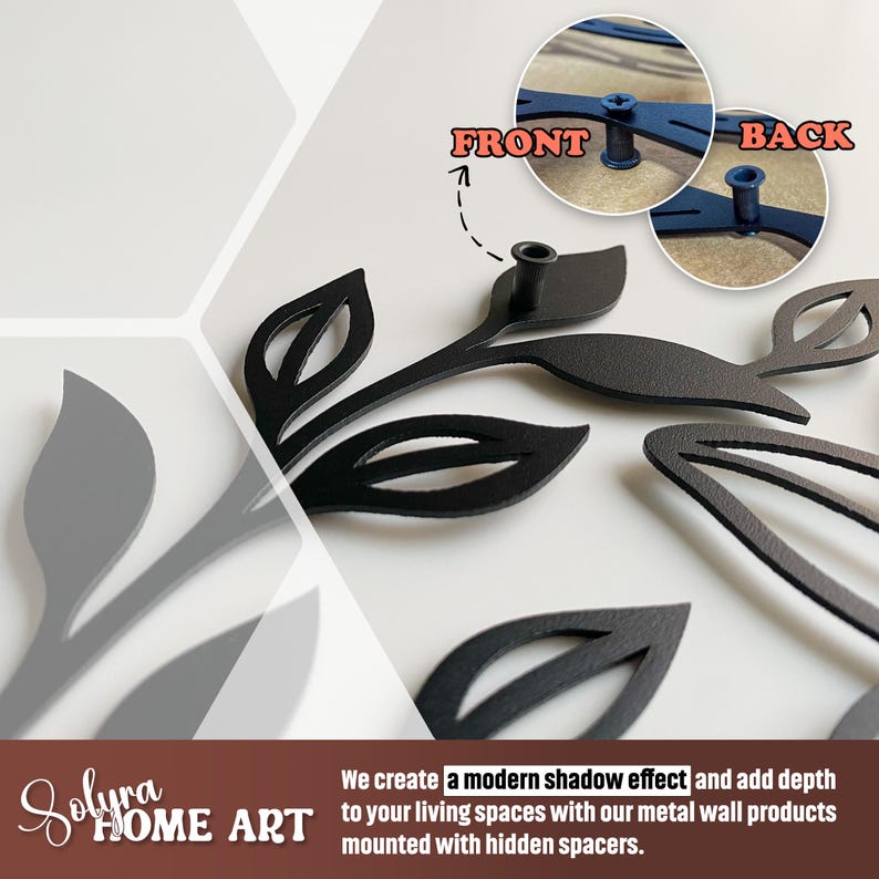 May include: Black metal leaf wall art with a modern shadow effect. The image shows the front and back of the leaf design, which is mounted with hidden spacers. The text reads "Solura Home Art".