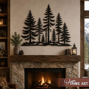 May include: A black metal wall art piece depicting a forest of pine trees. The artwork is mounted on a neutral-colored wall above a fireplace. The scene includes a rustic wooden mantel, a stone fireplace, and decorative items.