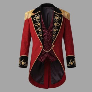 May include: A red tailcoat with black velvet trim and gold embroidery. The coat features gold fringe epaulets and a burgundy vest with a gold chain closure. The cuffs also have gold embroidery. This coat is suitable for cosplay or theatrical performances.