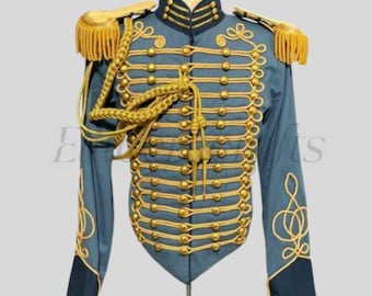 May include: A blue military-style jacket with gold-colored embellishments. The jacket features gold buttons, shoulder epaulettes, and decorative trim. The sleeves have gold scrollwork. The jacket is displayed on a stand.