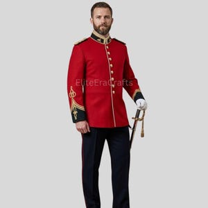 May include: A red military jacket with gold buttons, trim, and epaulets. The jacket has black and gold accents on the collar and cuffs. The person is wearing dark blue pants with a red stripe and holding a sword. The text "EliteEraCrafts" is visible.