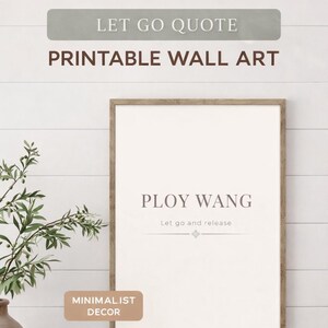 May include: Printable wall art with a wooden frame. The artwork features the name "Ploy Wang" and the phrase "Let go and release." The top of the image reads "Let Go Quote" and "Minimalist Decor" is at the bottom.