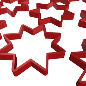 May include: A collection of red star-shaped cookie cutters. The cutters are made of a solid material and have a three-dimensional appearance. The stars are arranged in a repeating pattern against a white background.