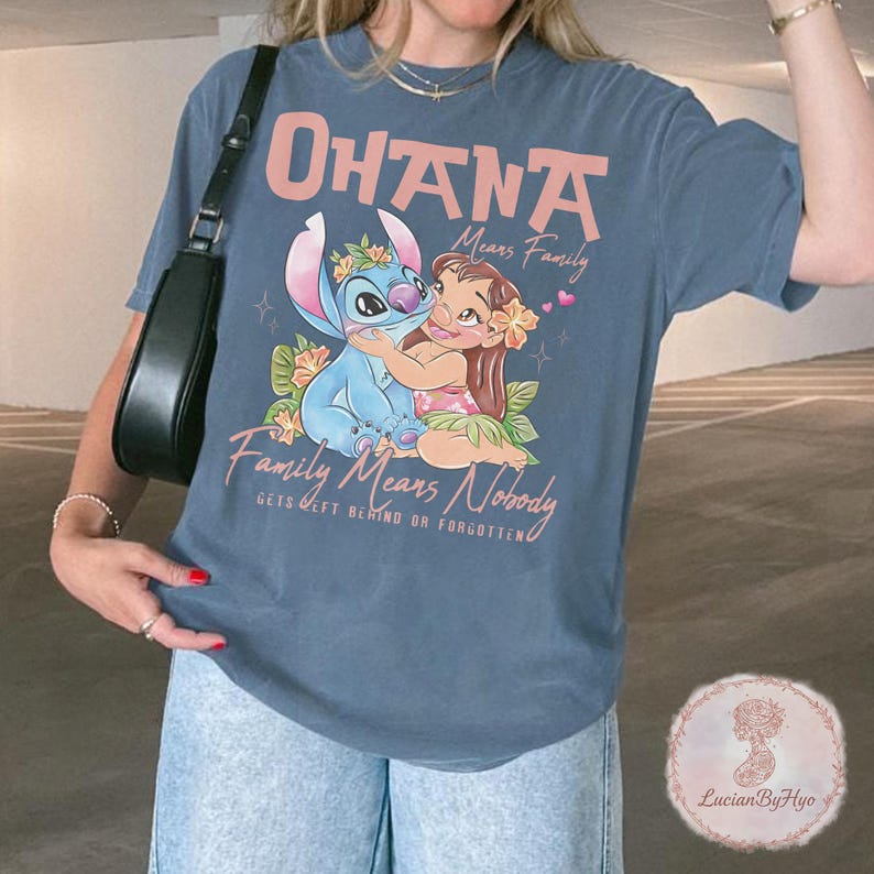 May include: A white ceramic mug with a black handle and the text "But first, coffee" in a black, handwritten-style font. The mug is on a white surface.