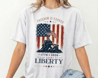 愛国的な自由のシャツ、自由250周年記念Tシャツ、自由は勝ち取るシャツ、1776年から2026年までのアメリカ建国記念日シャツ、アメリカ国旗Tシャツ