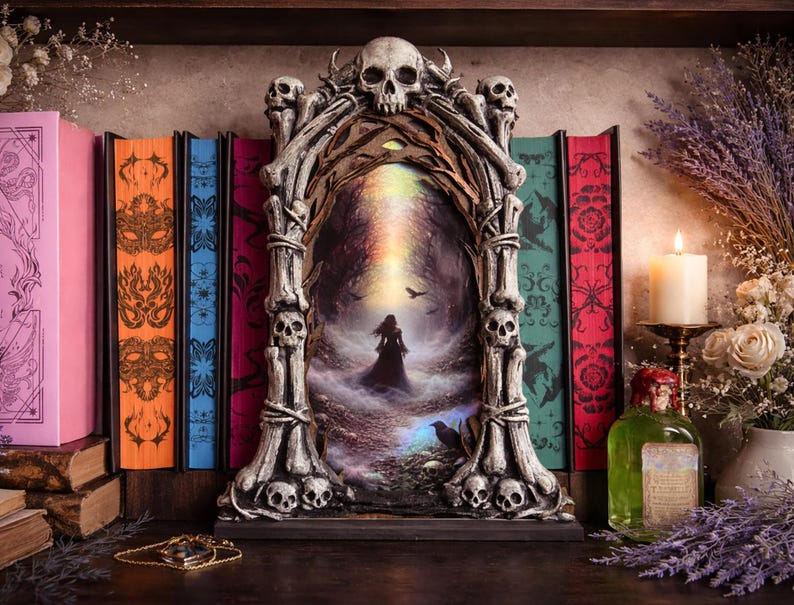 May include: A decorative gothic-style frame with a skull motif surrounds a mystical scene. The image features a figure in a dark forest, with colorful books and a candle in the background. A green bottle and a gold necklace are also visible.