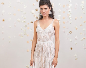 Bohemian lace wedding dress, delicate lace wedding dress with flowy skirt made from a combination of floral lace and soft chiffon mesh.