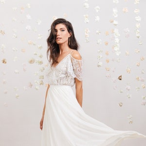 Bohemian wedding dress. Delicate lace wedding gown with off shoulder sleeves, comfortable and effortlessly beautiful lace wedding gown