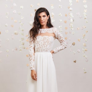 Breathtaking lace wedding dress with long sleeves, full circle chiffon skirt and a train.  modest wedding dress, boho wedding dress
