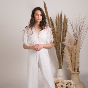 Wedding jumpsuit for the boho bride. A effortlessly beautiful modern wedding dress alternative. Lace wedding overalls. White wedding overall