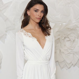 Best Seller - Simple wedding dress, lace trim at V-neckline, open back, flowy skirt, minimalist wedding dress, long sleeve wedding dress