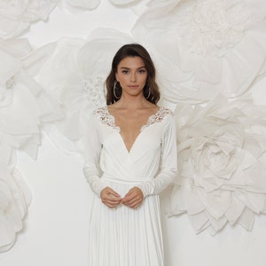 Wedding dress, lace trim at V-neckline, lace open back, flowing skirt, boho wedding dress, simple wedding dress, long sleeve wedding dress