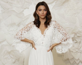 Effortlessly cool and comfortable bohemian wedding dress handmade from stunning floral lace with open back and butterfly sleeves.