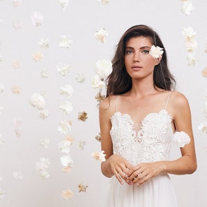 Strapless wedding dress with spaghetti straps and embroidery top