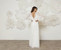 BEST SELLER lace wedding dress. Effortlessly cool and comfortable modern boho wedding dress with butterfly sleeves handmade from soft lace product logo