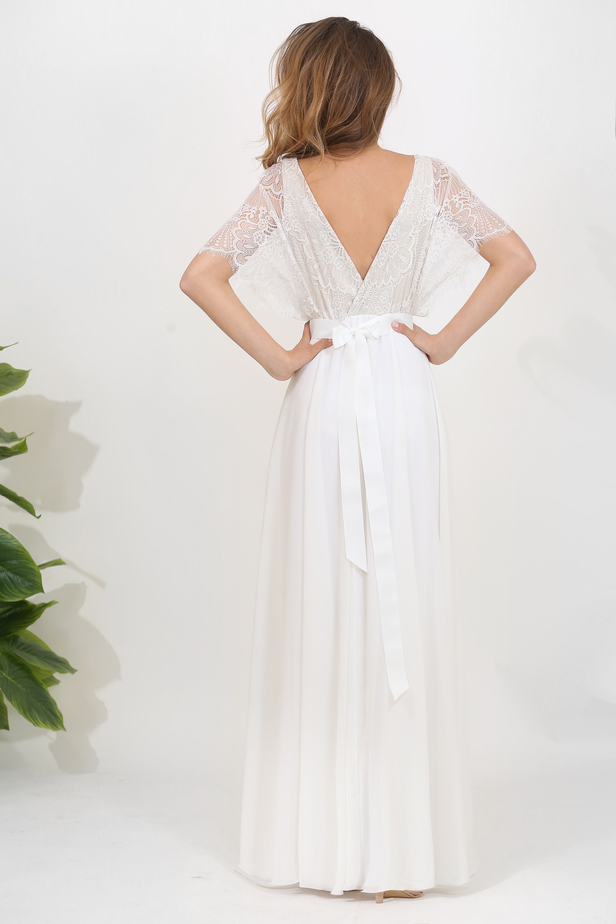 long sleeve lace mermaid style wedding dress Stunning Mermaid Lace Long Sleeves Wedding Dress with a Detachable Tra   Dairy Bridal