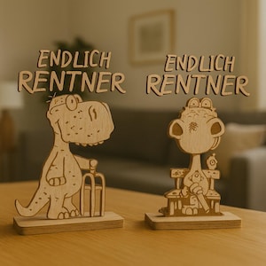 May include: Two wooden dinosaur figurines. One dinosaur is holding a cane and suitcase, the other is sitting on a bench. The text "ENDLICH RENTNER" is above each dinosaur. The figurines are on a wooden base.