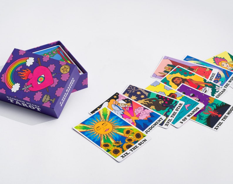 Rainbow Heart Tarot card deck with some cards out of the box- colorful tarot card deck with groovy retro stylization