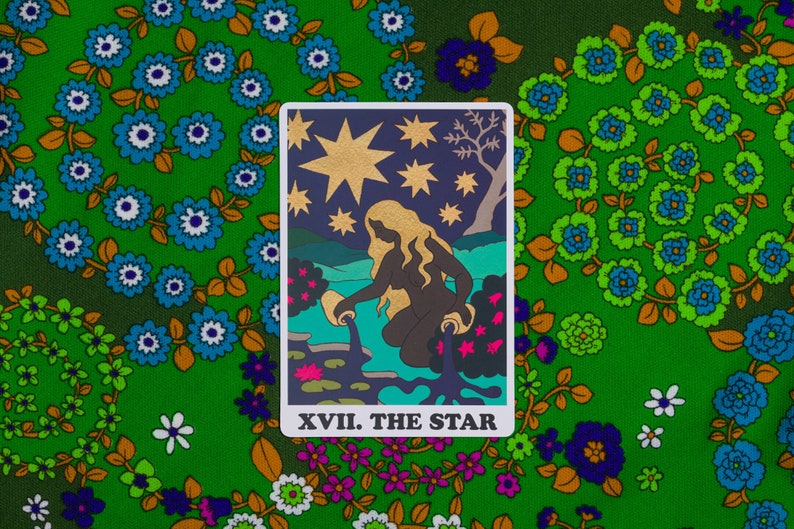 The Star card from the Rainbow Heart Tarot against retro floral fabric background