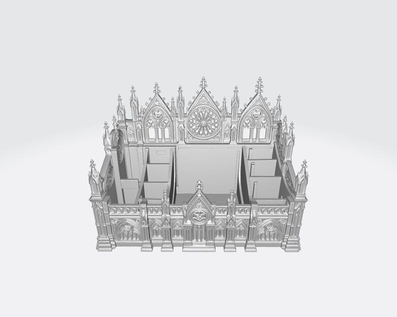 Puede incluir: Modelo gris impreso en 3D de una catedral, con intrincados detalles arquitect&oacute;nicos. El modelo tiene m&uacute;ltiples compartimentos y una fachada detallada con ventanas arqueadas y elementos decorativos. El dise&ntilde;o recuerda a la arquitectura g&oacute;tica.