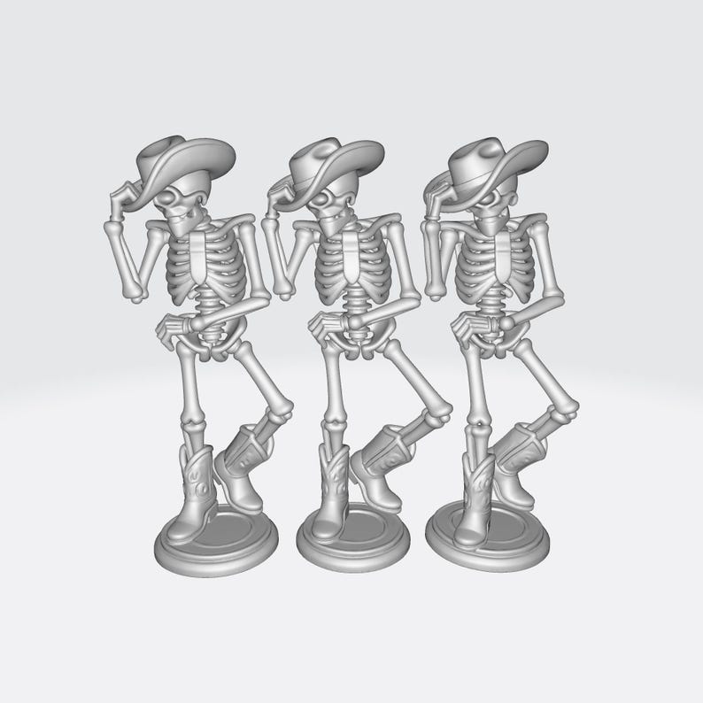 May include: Three gray skeleton figurines wearing cowboy hats and boots. Each skeleton is posed in a different stance, with one hand on their hat. The figures are standing on round bases.