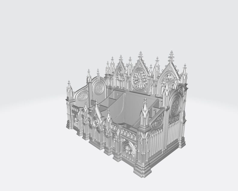 Puede incluir: Modelo gris impreso en 3D de una catedral g&oacute;tica. Presenta arcos apuntados, rosetones y pin&aacute;culos decorativos. El modelo tiene una base rectangular y m&uacute;ltiples niveles, mostrando intrincados detalles arquitect&oacute;nicos.
