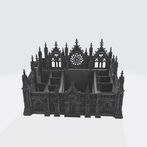 Puede incluir: Un organizador de escritorio de color gris oscuro, de estilo g&oacute;tico. El organizador tiene forma de catedral con intrincados detalles arquitect&oacute;nicos, incluyendo pin&aacute;culos, ventanas arqueadas y un roset&oacute;n. Tiene m&uacute;ltiples compartimentos para almacenamiento.