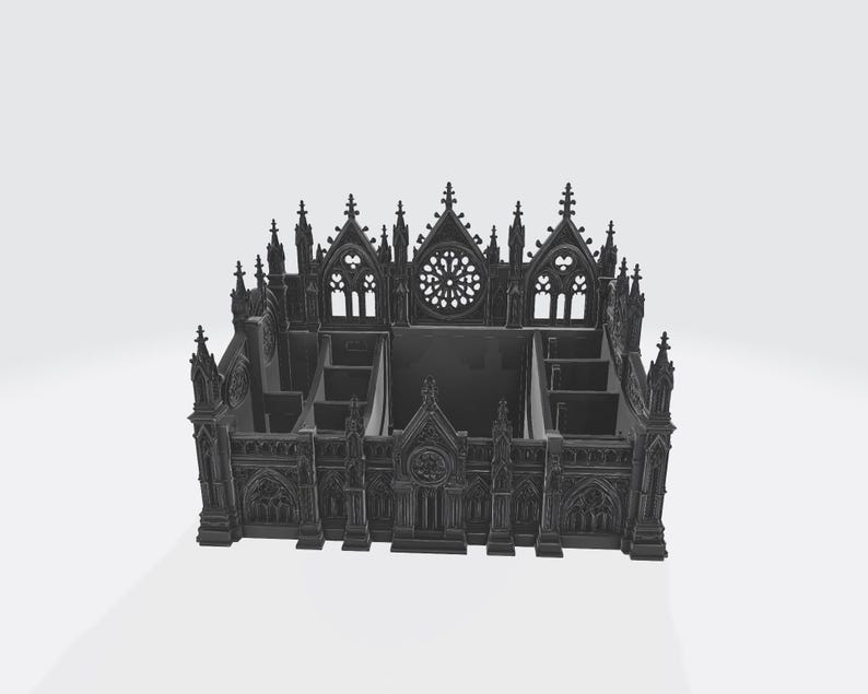 Puede incluir: Un organizador de escritorio de color gris oscuro, de estilo g&oacute;tico. El organizador tiene forma de catedral con intrincados detalles arquitect&oacute;nicos, incluyendo pin&aacute;culos, ventanas arqueadas y un roset&oacute;n. Tiene m&uacute;ltiples compartimentos para almacenamiento.