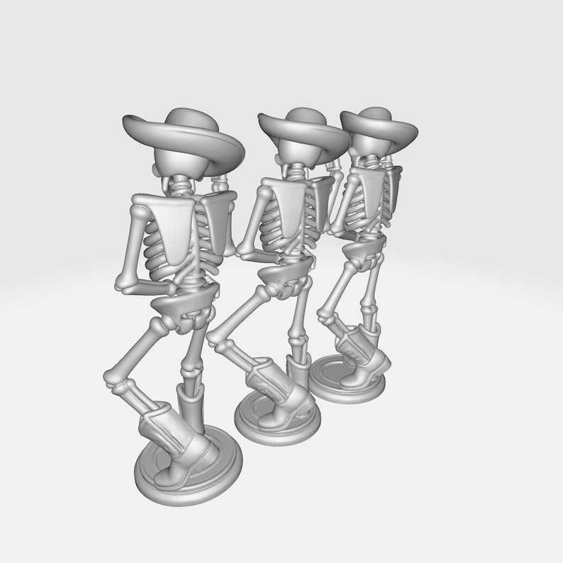 May include: Three gray skeleton figurines wearing cowboy hats and boots. The skeletons are posed in a line, with one leg raised as if dancing. Each figure is mounted on a circular base.