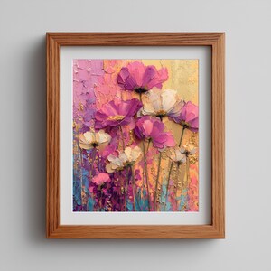 May include: A framed floral painting featuring textured brushstrokes. The artwork showcases vibrant pink and white flowers against a colorful background of purple, gold, and blue hues. The wooden frame adds a classic touch to the piece.