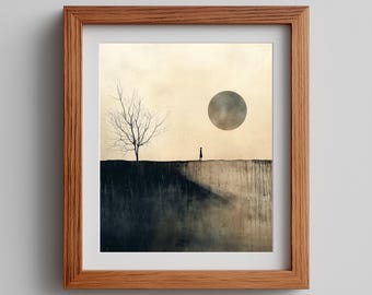 Puede incluir: Impresión artística enmarcada que presenta un paisaje surrealista. Una figura silueteada se encuentra sobre una cornisa bajo un gran orbe gris, con un árbol desnudo a la izquierda. La obra de arte está ambientada en un cielo beige apagado y enmarcada en madera natural.