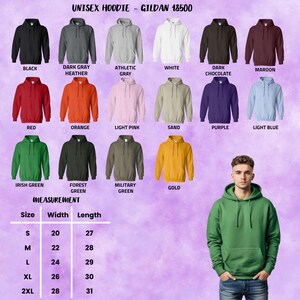 Op de afbeelding: Afbeelding van Gildan 18500 unisex hoodies in diverse kleuren, waaronder zwart, grijs, wit, rood en groen. De afbeelding bevat een maattabel met afmetingen in inches, wat overeenkomt met ongeveer 51 cm tot 71 cm breedte en 69 cm tot 79 cm lengte.