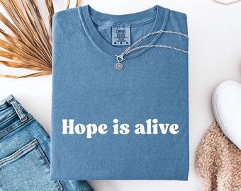 Camiseta Comfort Colors Zohran Hope Is Alive, Camiseta Zohran para Nova York, Camiseta Esperança Comunitária, Camiseta Movimento Organizador, Camiseta Ativista Progressista
