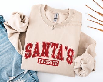Moletom de Natal favorito do Papai Noel, blusa de gola redonda fofa para as festas de fim de ano, camiseta de Natal divertida para mulheres, pulôver aconchegante de inverno com estampa.