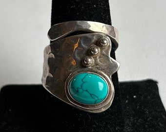 Sterling Silver Bypass Ring With A Blue Stone-Size 9 Adjustable