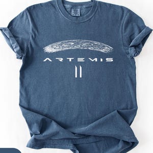 May include: A rustic wooden sign with the text "Welcome to our home" in white lettering. The sign features a distressed finish and a simple, inviting design, perfect for entryway decor.